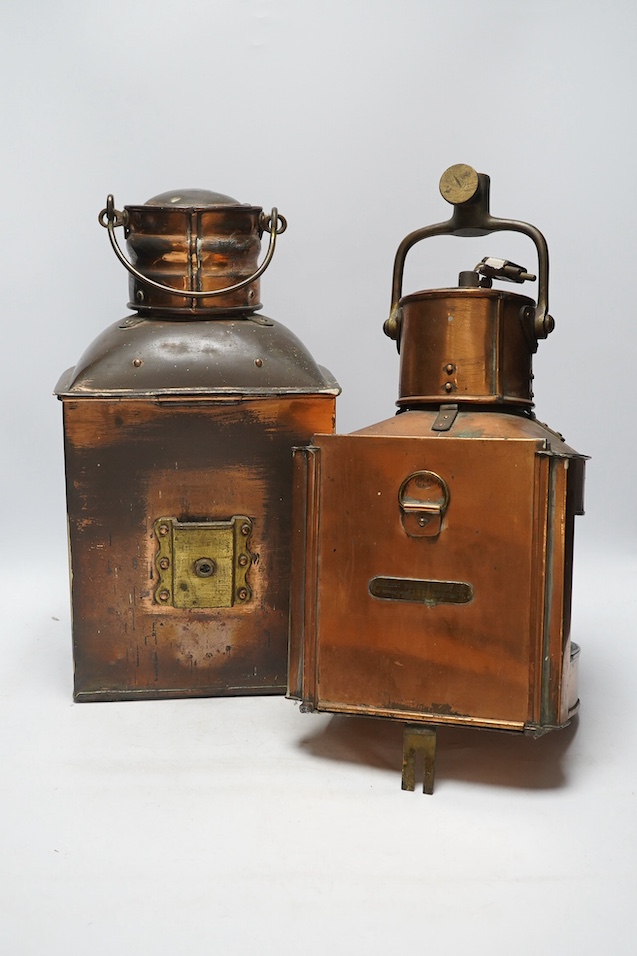 Two copper ship's bulkhead lamps, tallest 39cm. Condition - fair to good, some dents, wear etc.